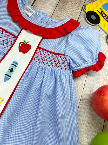 zoom detail of neck, and embroidery on back to school dress
