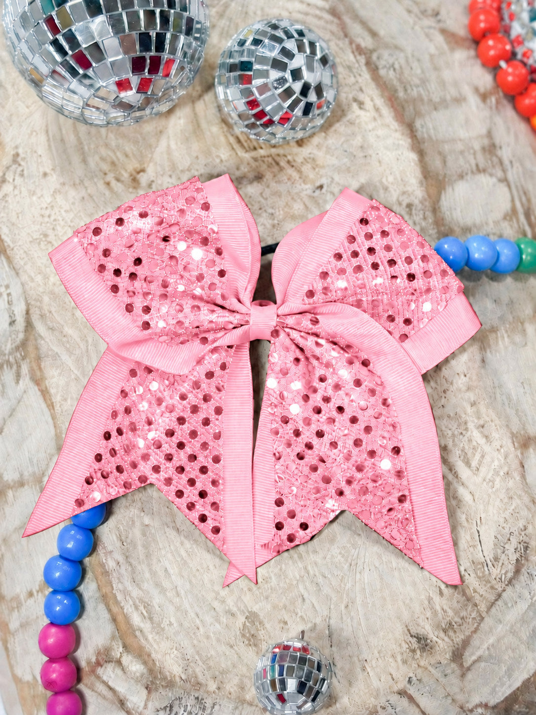 Pink sequin cheer hair bow