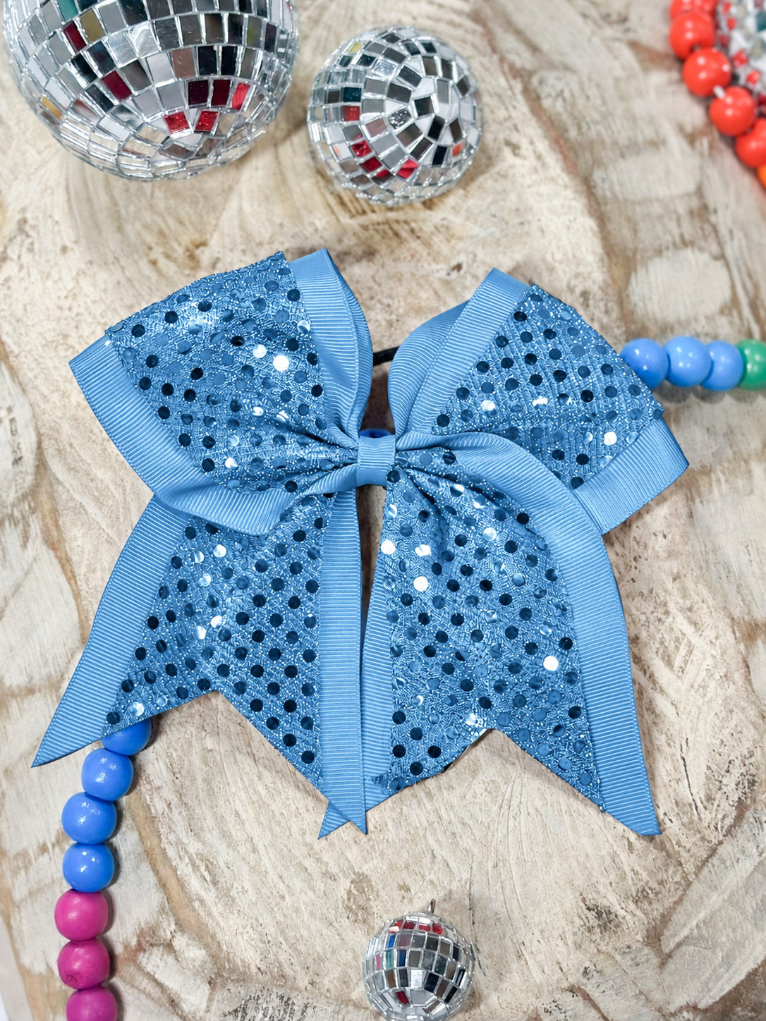 Turquoise sequin cheer hair bow