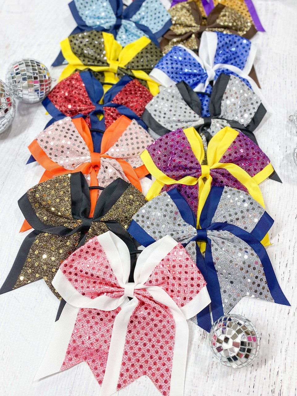 Sequin school spirit cheer bows on pony-o in assorted team colors