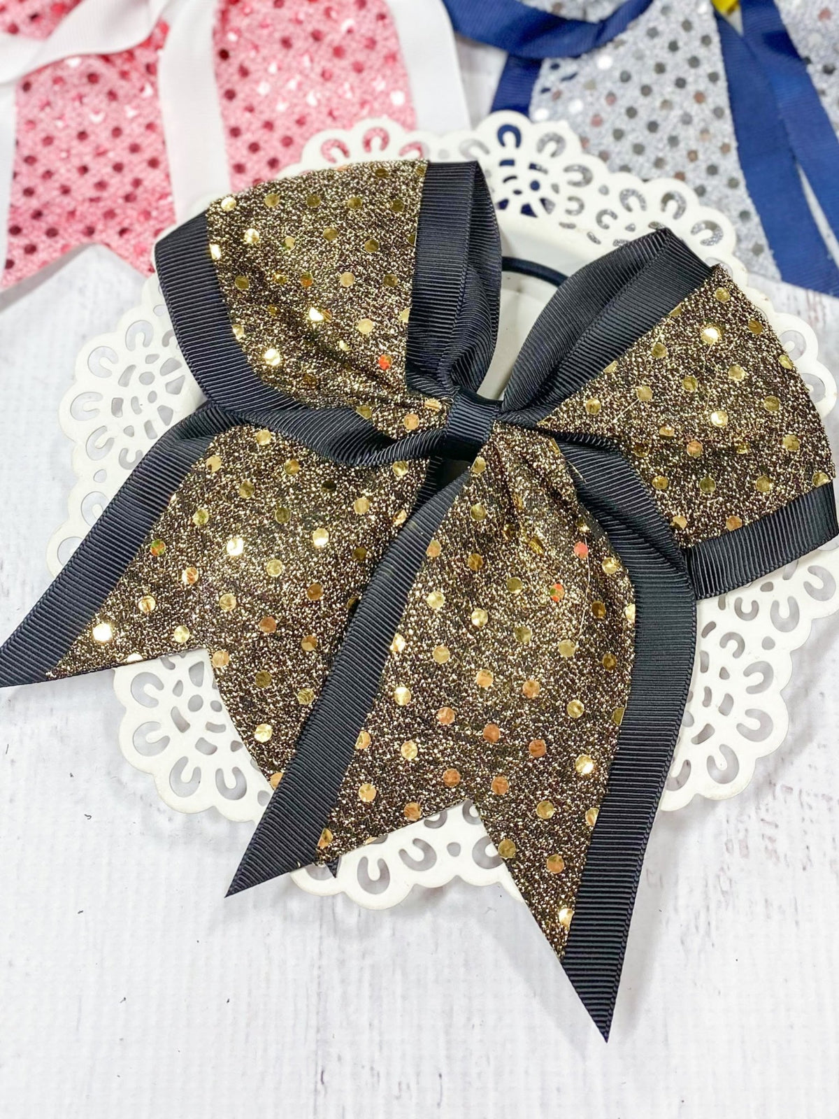 Gold and black sequin school spirit cheer bow on pony-o