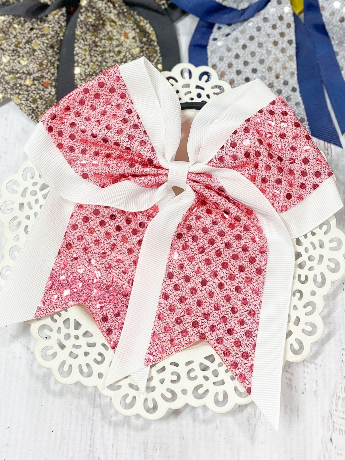 Light pink and white sequin school spirit cheer bow on pony-o