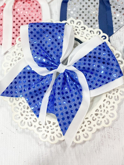 Royal blue and white sequin school spirit cheer bow on pony-o