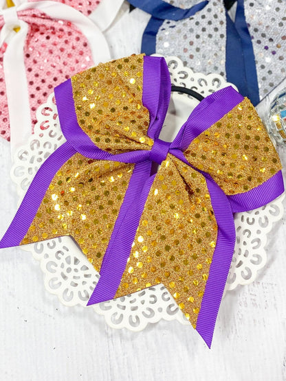 Yellow and purple sequin school spirit cheer bow on pony-o