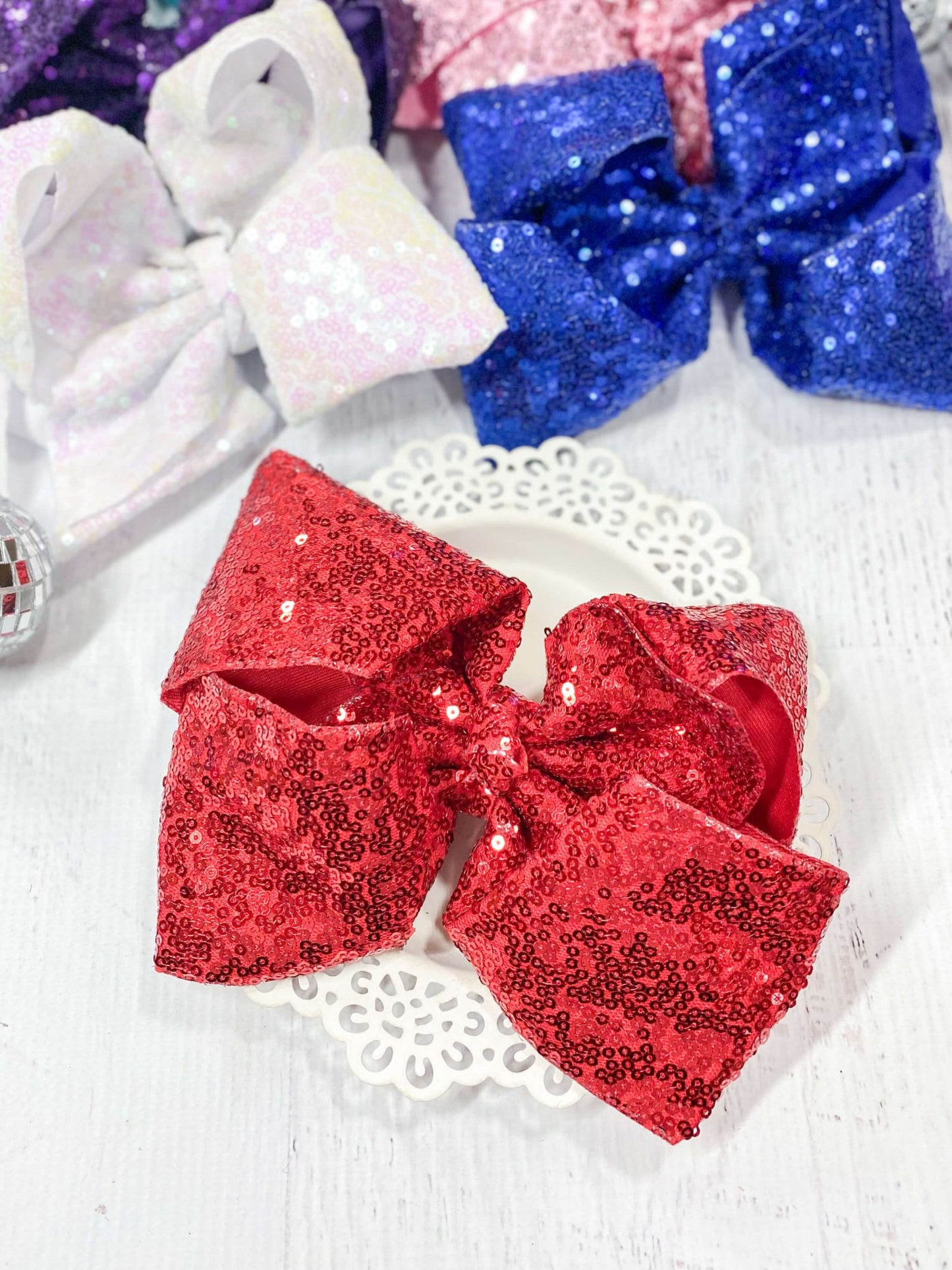 red texas size sequin bow