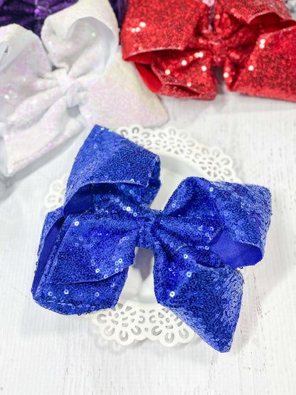royal blue texas size sequin bow