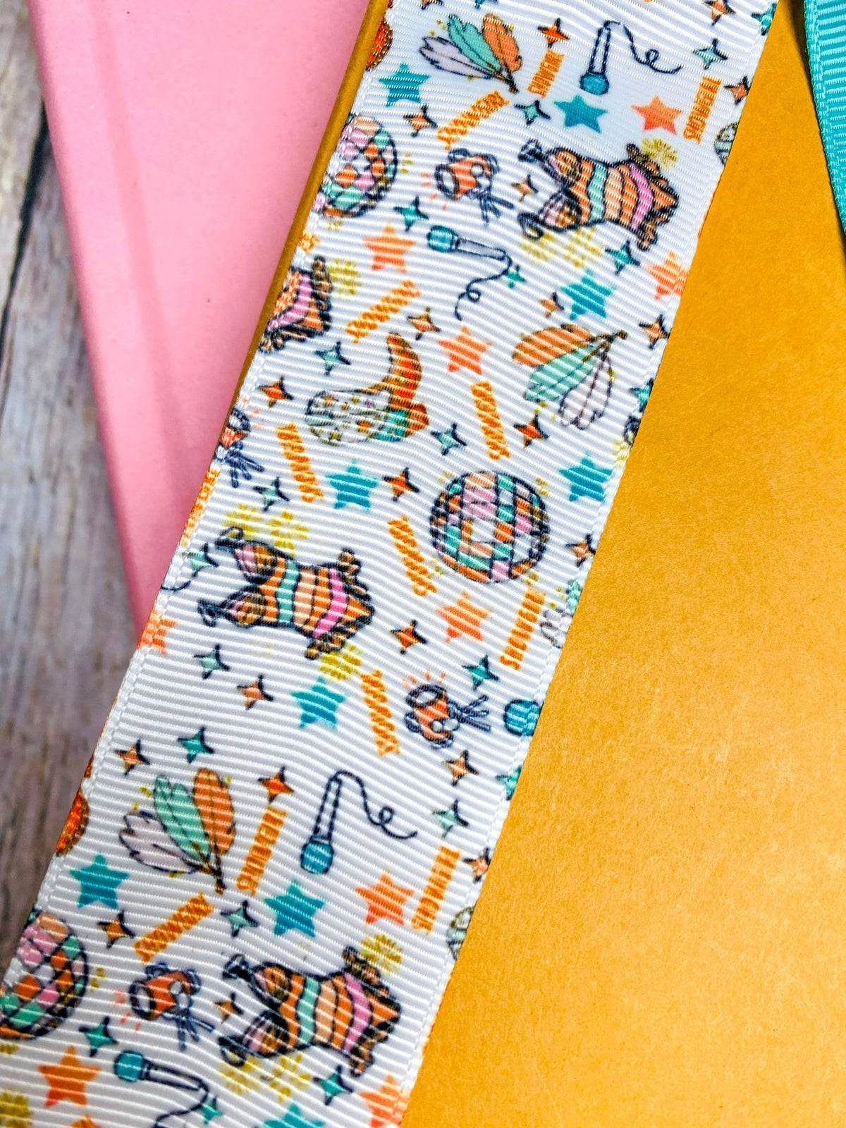 Close-up of colorful Showgirl Era ribbon print