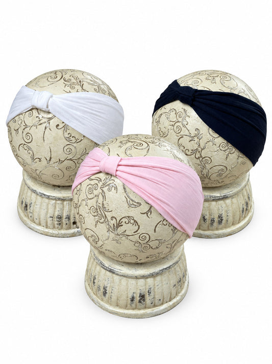 nylon interchangeable baby headbands for hair bows in a mulitpack of black, white and pink