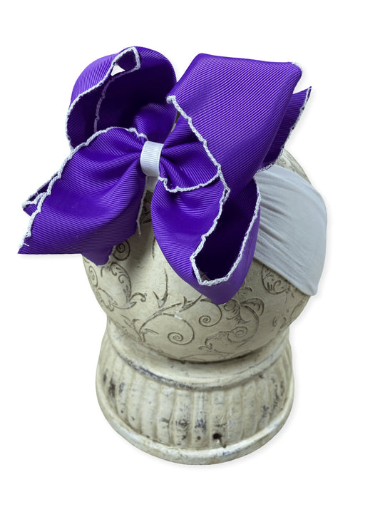 Soft nylon interchangeable headband shown with a purple hair bow - Alternative view