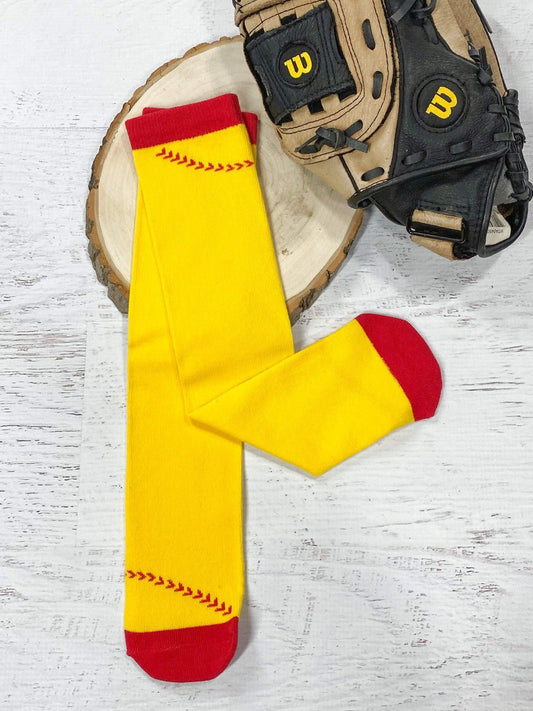 Yellow softball tube socks with red stitching