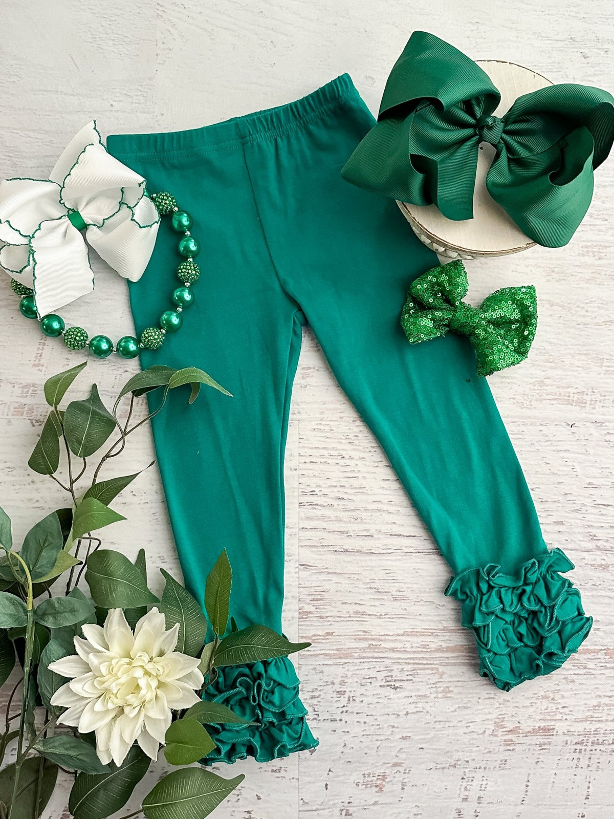 Emerald green ruffle icing leggings