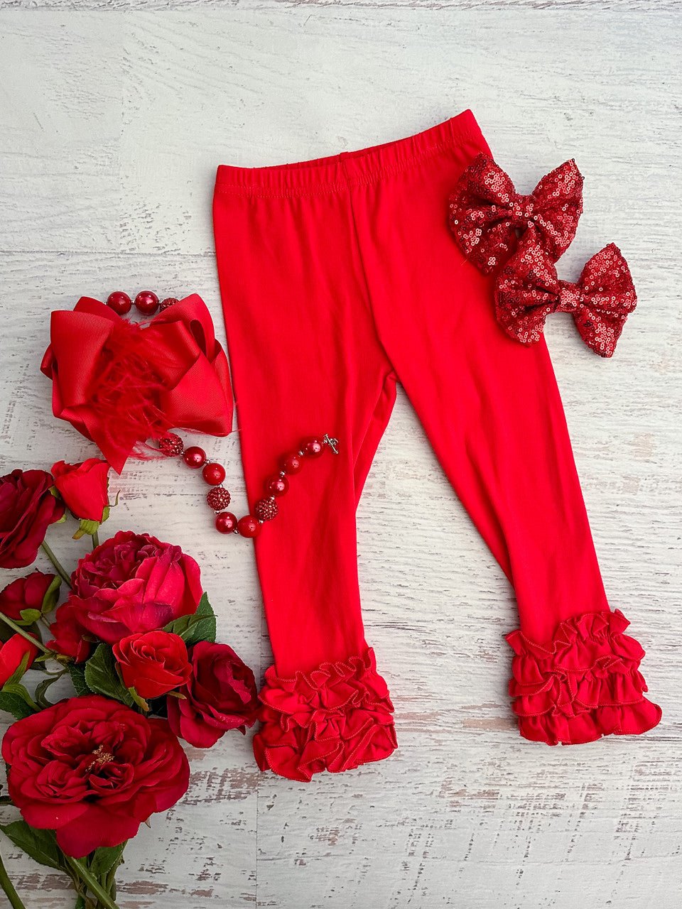 Red ruffled icing leggings