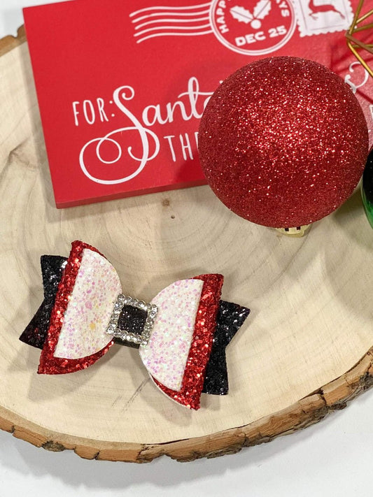 Glitter Santa belt bow on a double alligator clip.