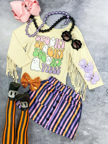 Spooky Vibes fringe top with a purple and orange striped skirt