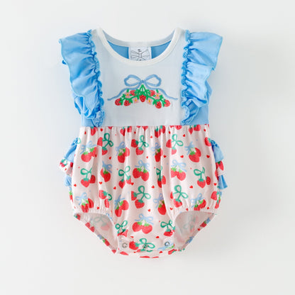 Baby romper with blue ruffled sleeves and cherry pattern on a white background