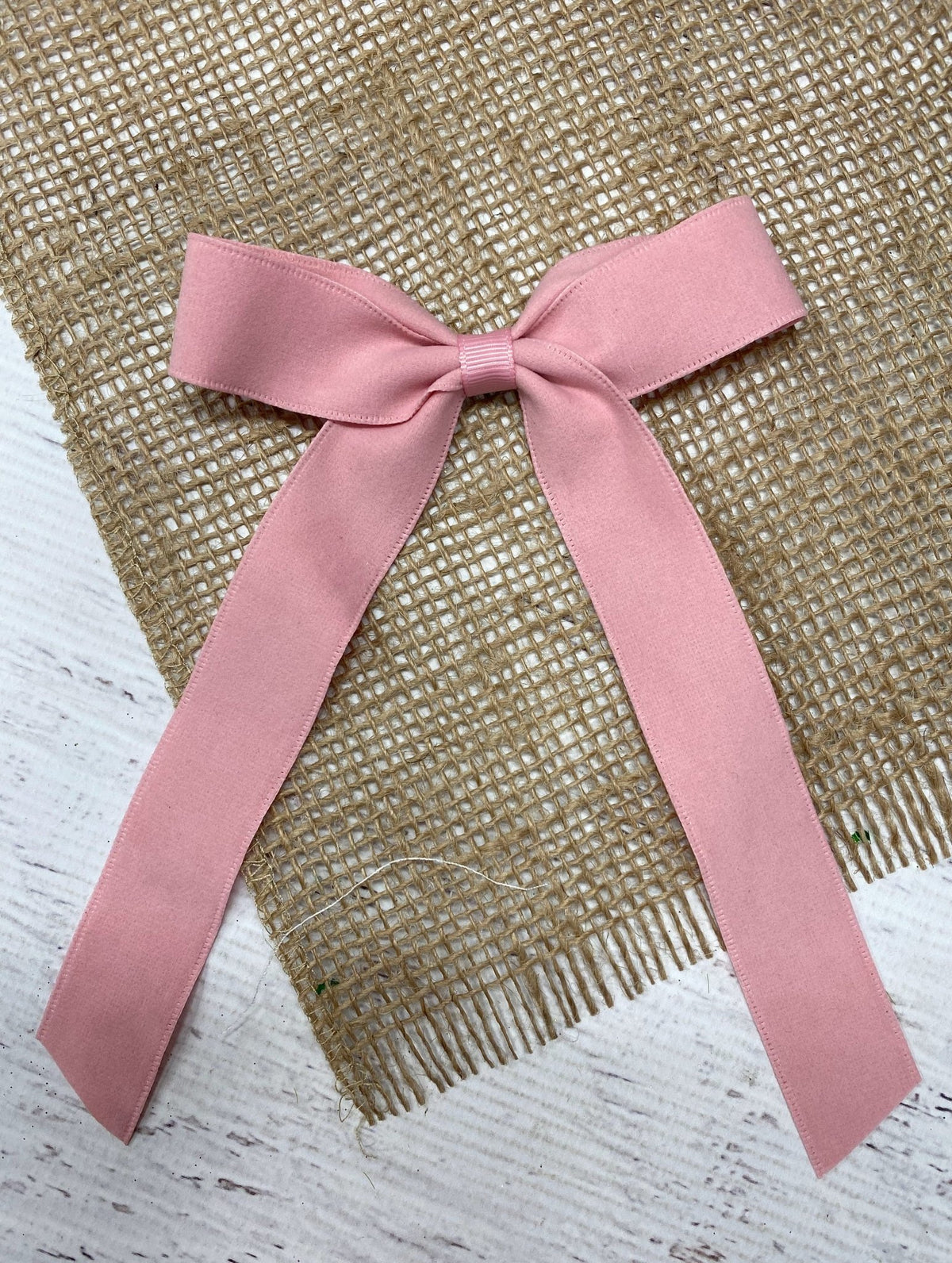 Pink thin suede ribbon long tail hair bow