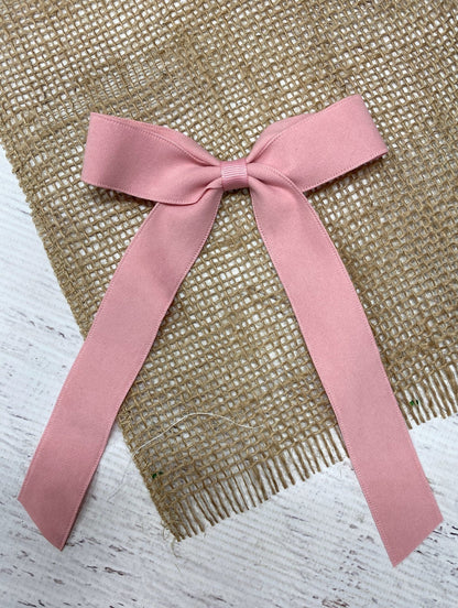 Pink thin suede ribbon long tail hair bow