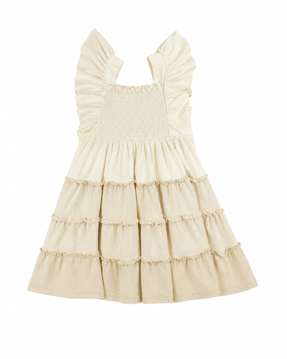 neutral tiered dress on a white background