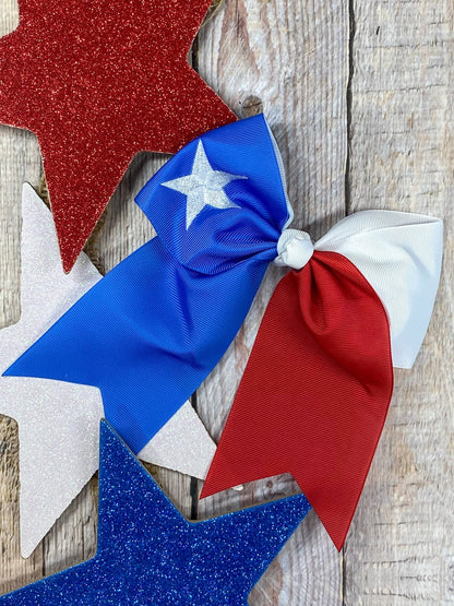 Texas flag embroidered cheer bow on a large clip