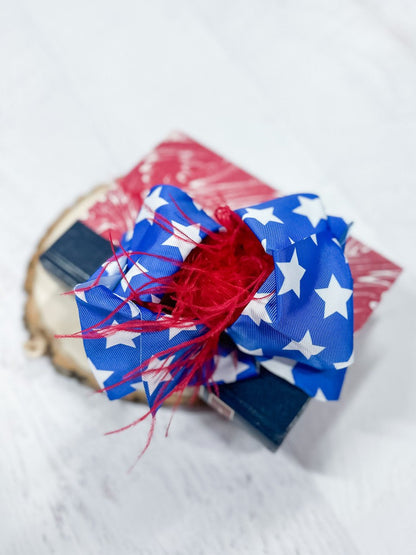 star ribbon with red puff center