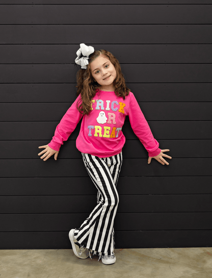 Model wearing the Trick or Treat Pink Chenille Sweater