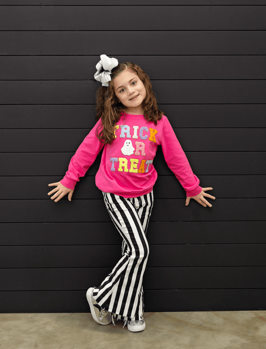 Model wearing the Trick or Treat Pink Chenille Sweater