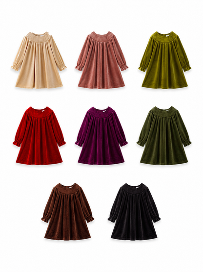 Eight girls’ smocked velvet holiday dresses in ivory, dusty rose, light olive, red, plum, dark olive, brown and black.