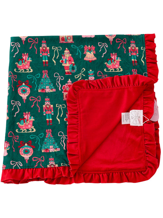 Green vintage Christmas print baby blanket with red ruffle trim
