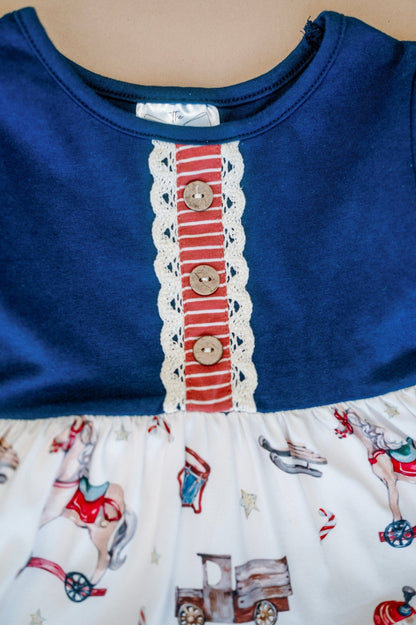 Detail of the vintage Christmas toys girls tunic top