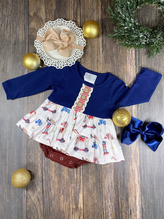 Vintage Christmas Toys Infant Romper with navy top and festive toy print skirt