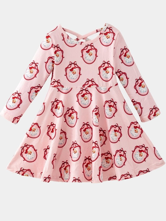 Girls Vintage Santa Christmas twirl dress with long sleeves, pink striped fabric, classic Santa portrait print, and a full twirl skirt on a white background.