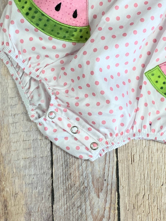 Close up detail photo of the snaps at bottom of romper - Alternative view