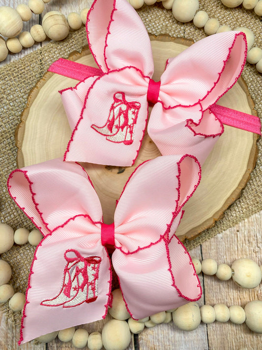 Pink Western Boot Embroidered Moonstitch Hair Bow and Head band on a wooden background