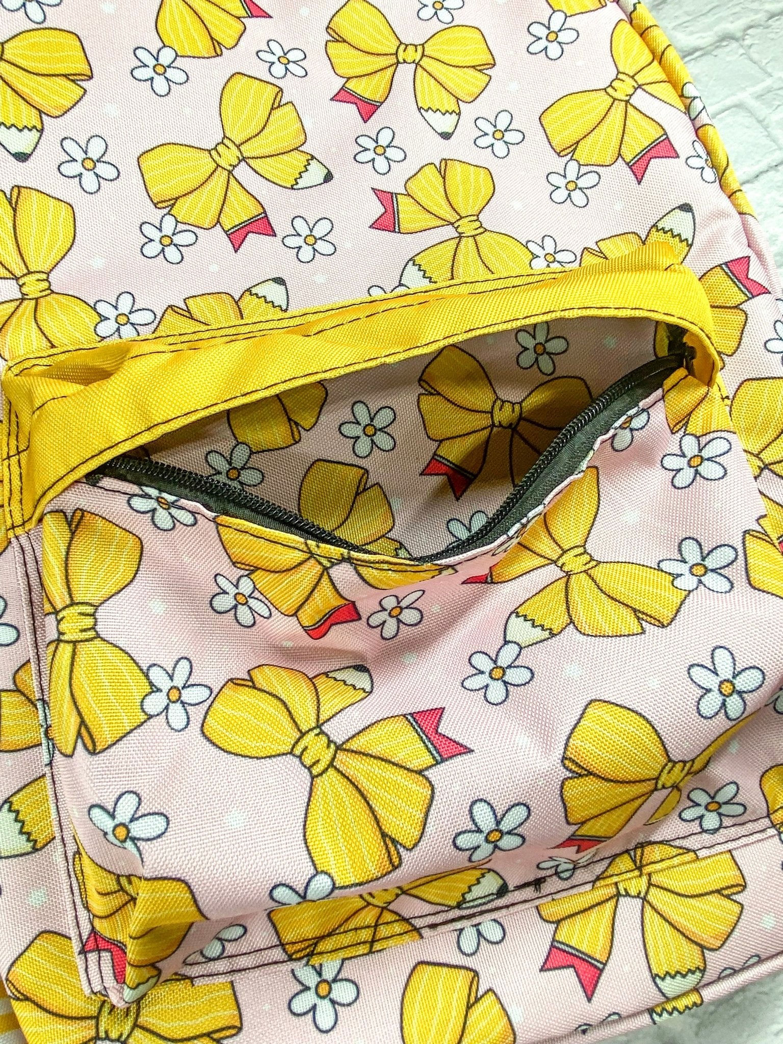close up photo of front pocket on backpack