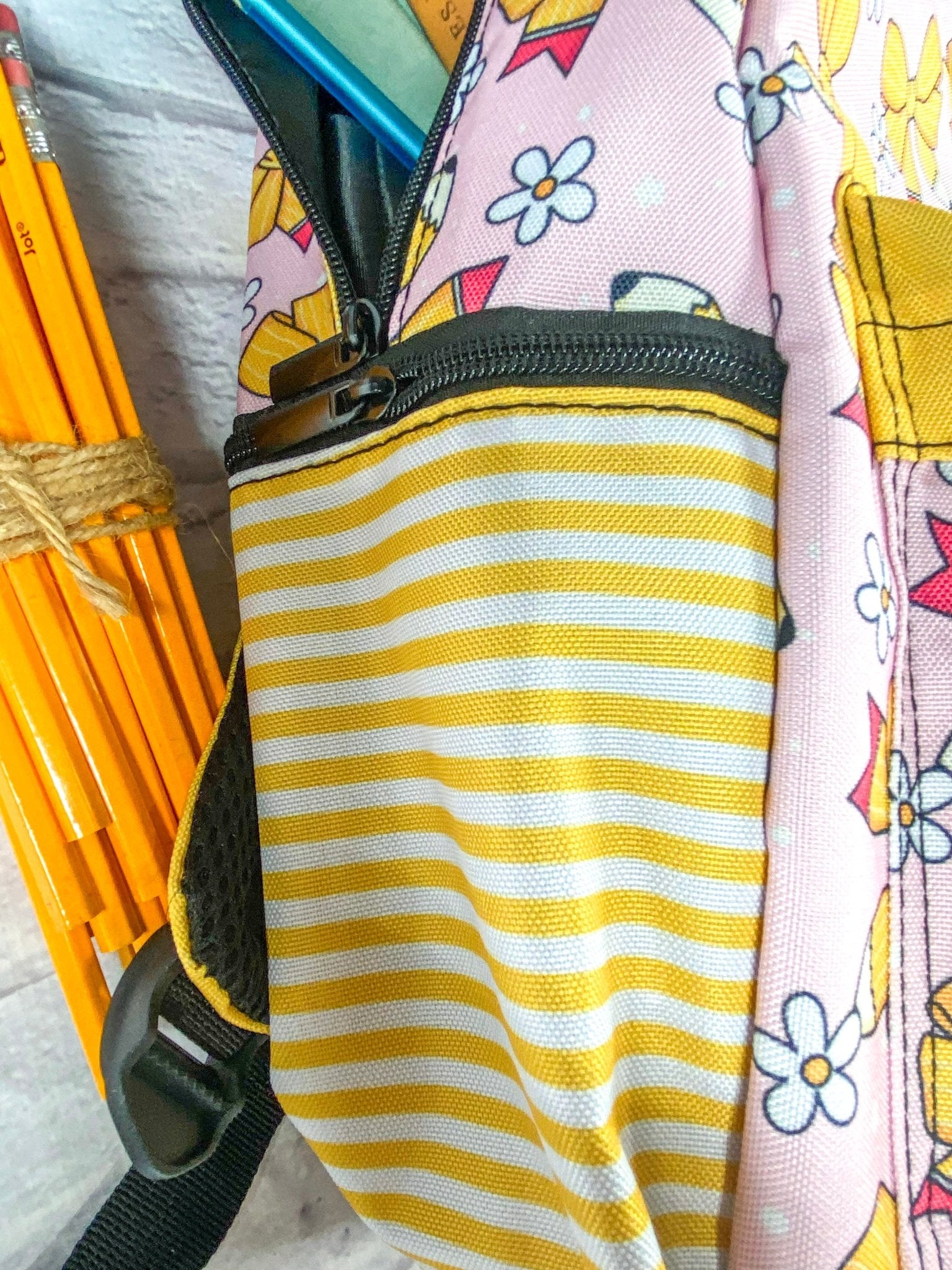 close up photo of side pocket on the backpack